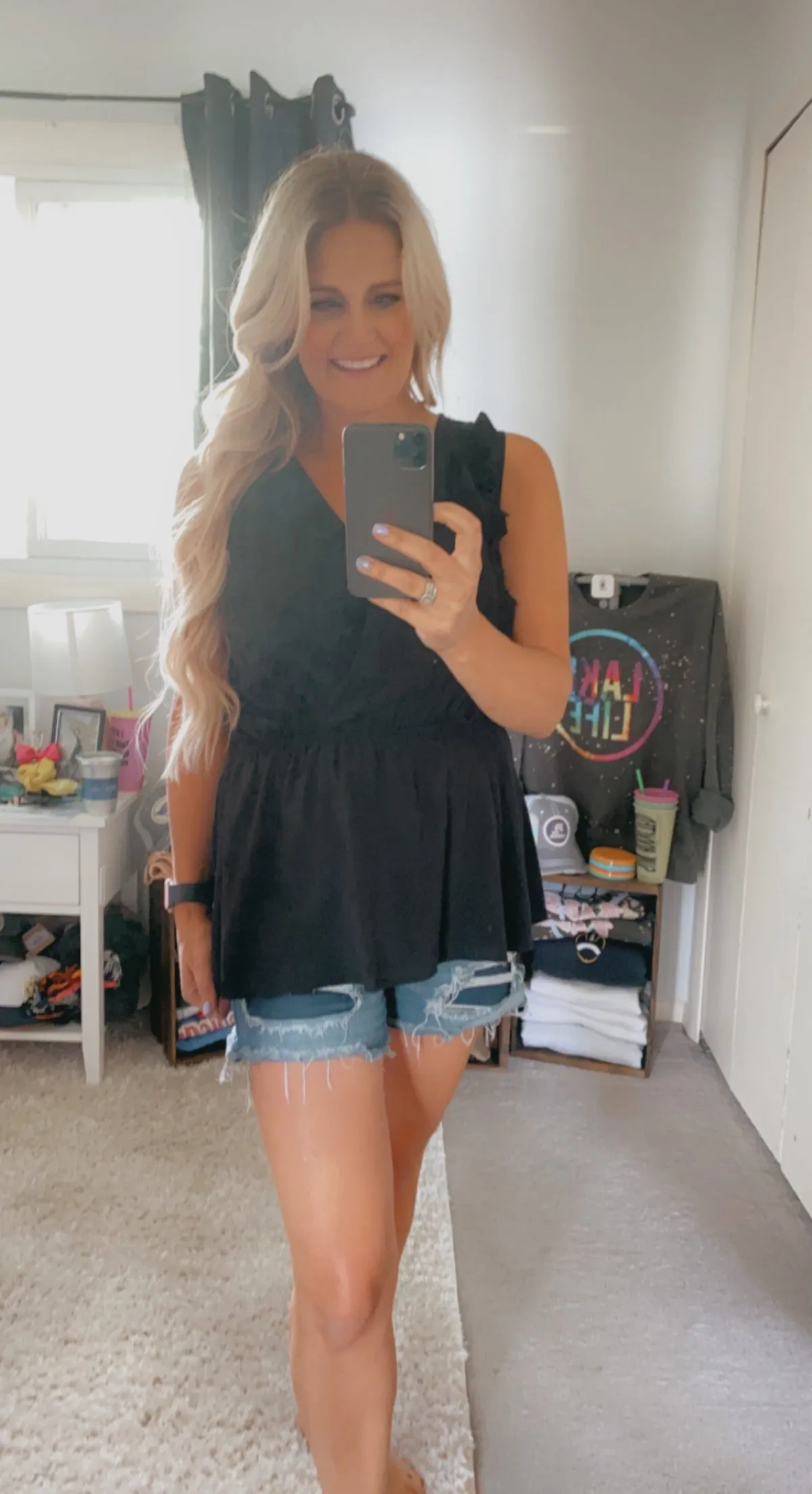 Black ruffle sleeveless top